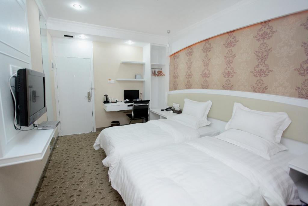 Xinghe Xinfeng Hotel Гуанчжоу Номер фото