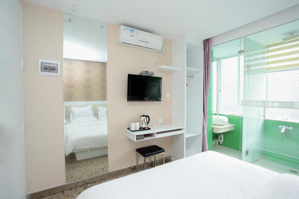 Xinghe Xinfeng Hotel Гуанчжоу Номер фото