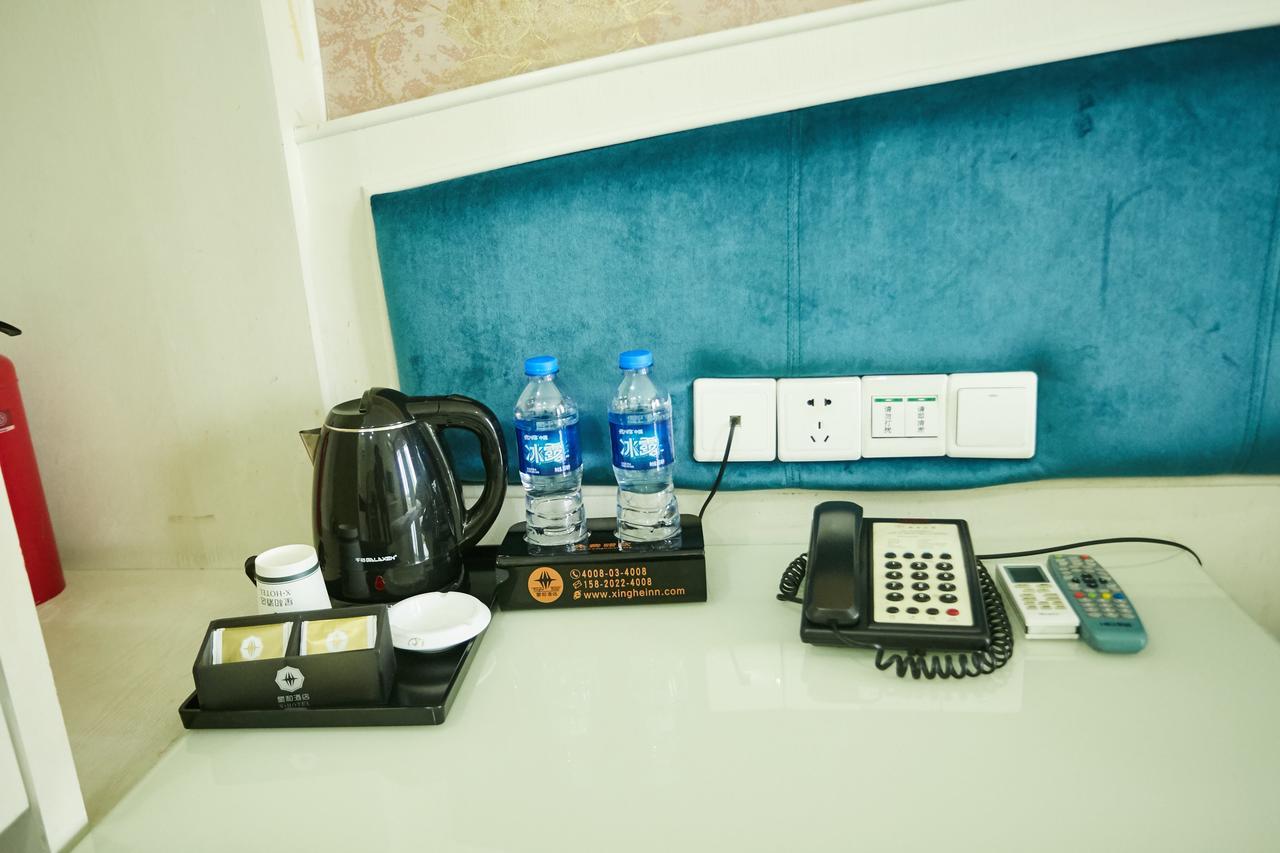 Xinghe Xinfeng Hotel Гуанчжоу Экстерьер фото